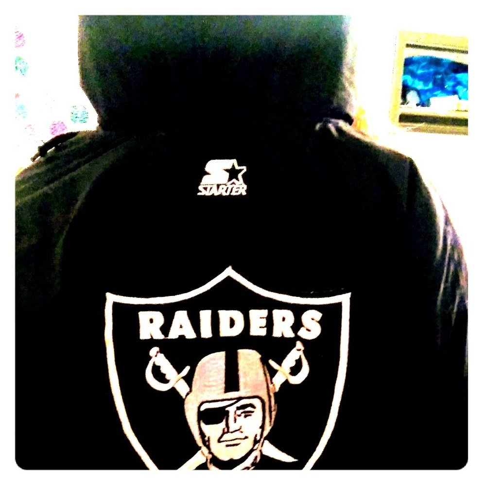 A junior RAIDERS  starter jacket